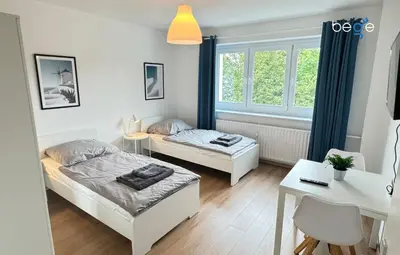 Ein Bett oder Betten in einem Zimmer der Unterkunft BEGE APARTMENTS Corporate Hub