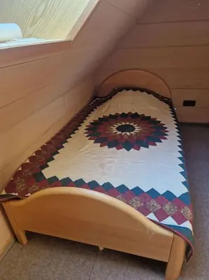 Ein Bett oder Betten in einem Zimmer der Unterkunft Appartement mit 2 separaten Schlafzimmern