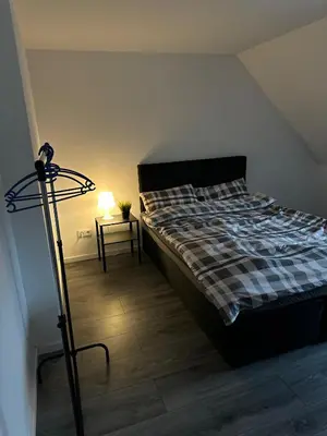 Ein Bett oder Betten in einem Zimmer der Unterkunft HomeBerg Duisburg - feine 3 Zimmer, 4 Betten, 60qm in Top Lage