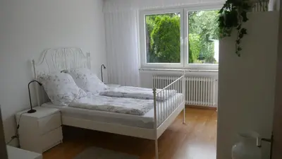 Ein Bett oder Betten in einem Zimmer der Unterkunft Ferienwohnung Brunsbachtal