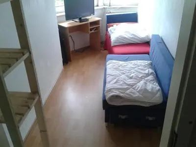 Ein Bett oder Betten in einem Zimmer der Unterkunft MonteurRoomMR