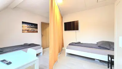 Ein Bett oder Betten in einem Zimmer der Unterkunft -CS24- Six rooms apartment with terrace - KP01