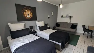 Ein Bett oder Betten in einem Zimmer der Unterkunft Gemütliche Wohnung mit Parkplatz
