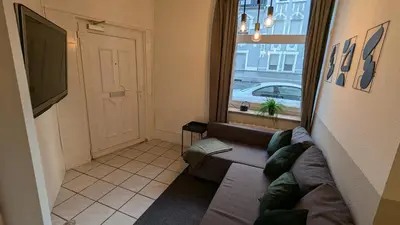 Ein Sitzbereich in der Unterkunft Gemütliche Wohnung mit Parkplatz