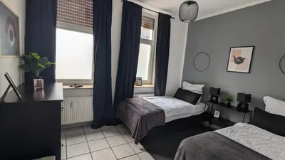 Ein Bett oder Betten in einem Zimmer der Unterkunft Gemütliche Wohnung mit Parkplatz