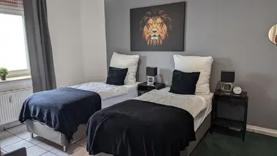 Ein Bett oder Betten in einem Zimmer der Unterkunft Gemütliche Wohnung mit Parkplatz