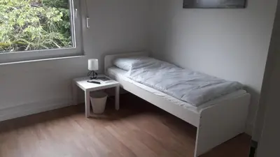 Ein Bett oder Betten in einem Zimmer der Unterkunft Work & Stay in Menden- rooms2stay