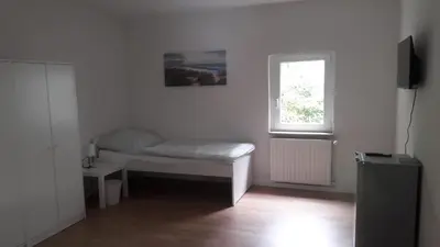 Ein Bett oder Betten in einem Zimmer der Unterkunft Work & Stay in Menden- rooms2stay