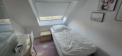 Ein Bett oder Betten in einem Zimmer der Unterkunft Wohnung Düsseldorf Ratingen nähe Messe Flughafen Uni Essen