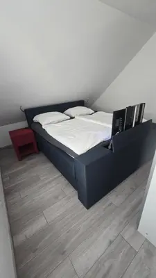 Ein Bett oder Betten in einem Zimmer der Unterkunft Wohnung Düsseldorf Ratingen nähe Messe Flughafen Uni Essen