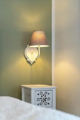 Ein Bett oder Betten in einem Zimmer der Unterkunft Flora Comfort Inn