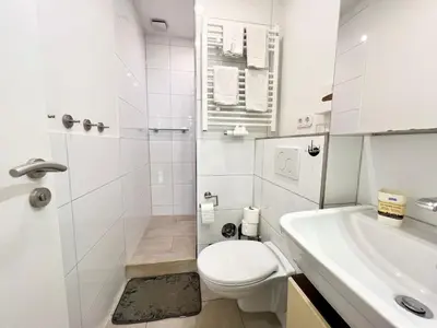 Ein Badezimmer in der Unterkunft NewYork Suite für 4 mit Küche und WIFI