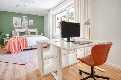 TV/Unterhaltungsangebot in der Unterkunft NEU Life&Work in Mülheim mit Garten
