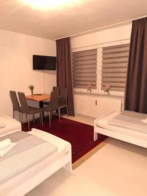 Ein Bett oder Betten in einem Zimmer der Unterkunft Tam Wohnung