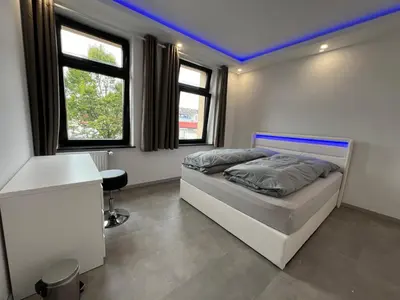 Ein Bett oder Betten in einem Zimmer der Unterkunft Schöne Mitte von Oberhausen