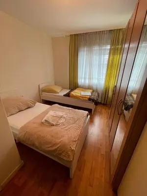 Ein Bett oder Betten in einem Zimmer der Unterkunft MAD Ferienwohnungen 2