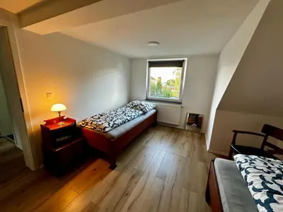 Ein Bett oder Betten in einem Zimmer der Unterkunft Bee Flats