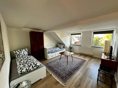 Ein Sitzbereich in der Unterkunft Bee Flats