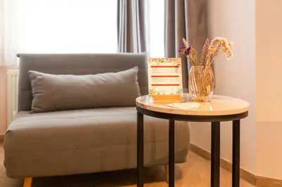 Ein Sitzbereich in der Unterkunft Hotel Restaurant Am Park
