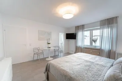 Ein Bett oder Betten in einem Zimmer der Unterkunft Zentral gelegenes Appartment