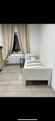 Ein Bett oder Betten in einem Zimmer der Unterkunft Stylish & Relaxing Modernes Apartment mit Privatparkplatz
