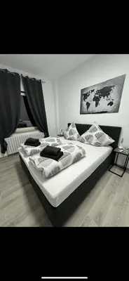 Ein Bett oder Betten in einem Zimmer der Unterkunft Stylish & Relaxing Modernes Apartment mit Privatparkplatz