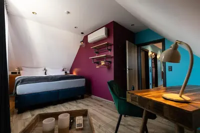Ein Bett oder Betten in einem Zimmer der Unterkunft Boutique Apartments by Roy Oberhausen