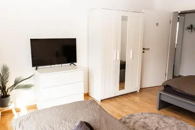 TV/Unterhaltungsangebot in der Unterkunft CosyHomes24 - Centrally with parking space and balcony - GE09b