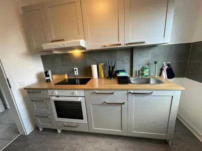 Küche/Küchenzeile in der Unterkunft 21-schickes, modernes Apartment am Volkspark in Herten-herzlich Willkommen!