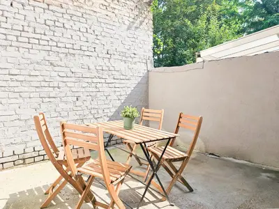 Ein Patio oder anderer Außenbereich in der Unterkunft Tolstov Apartments - 2 Zimmer Wohnung mit Terrasse - 25 Min Messe DUS