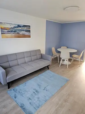 Ein Sitzbereich in der Unterkunft Helle und ruhige Ferienwohnung im Ruhrgebiet mit Balkon und Garten