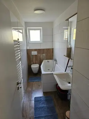 Ein Badezimmer in der Unterkunft Helle und ruhige Ferienwohnung im Ruhrgebiet mit Balkon und Garten