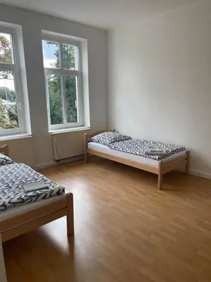 Ein Bett oder Betten in einem Zimmer der Unterkunft ES-Unterkunft Dinslaken