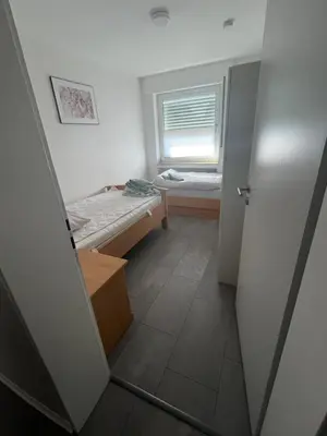Ein Bett oder Betten in einem Zimmer der Unterkunft Red Dot Eva