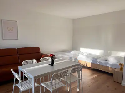 Ein Bett oder Betten in einem Zimmer der Unterkunft T&K Apartments - Düsseldorf - 3 room apartment with private parking 7min Fair and Airport DUS
