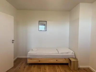Ein Bett oder Betten in einem Zimmer der Unterkunft T&K Apartments - Düsseldorf - 3 room apartment with private parking 7min Fair and Airport DUS