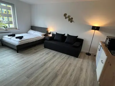 Ein Bett oder Betten in einem Zimmer der Unterkunft Business Apartment 13 Essen