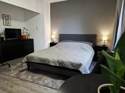 Ein Bett oder Betten in einem Zimmer der Unterkunft Business Apartment am Bergmannsheil KH Wlan