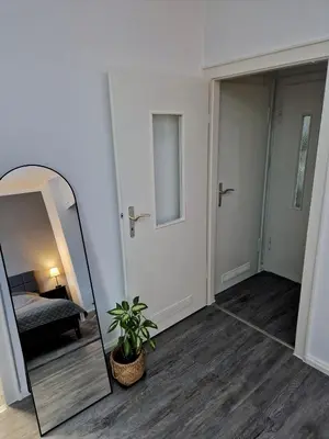 Ein Bett oder Betten in einem Zimmer der Unterkunft Business Apartment am Bergmannsheil KH Wlan