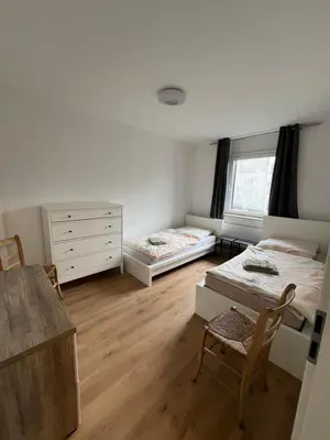 Ein Bett oder Betten in einem Zimmer der Unterkunft Moderne Ferienwohnung