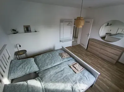 Ein Bett oder Betten in einem Zimmer der Unterkunft Comfortable Apartment with balcony