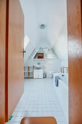 Ein Bett oder Betten in einem Zimmer der Unterkunft Ferienwohnung Oberhausen Sterkrade Maisonette nahe CentrO
