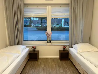 Ein Bett oder Betten in einem Zimmer der Unterkunft T&K Apartments- 2 Room Apartment - Heart of Solingen - Private parking