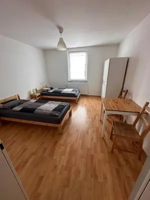 Ein Bett oder Betten in einem Zimmer der Unterkunft Ferien- Monteurapartments nähe Veltins Arena