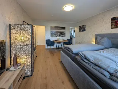 Ein Bett oder Betten in einem Zimmer der Unterkunft H-Aparts Essen - TOP Apartments in Best-Lage