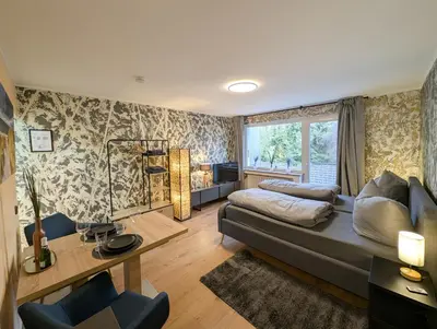 Ein Sitzbereich in der Unterkunft H-Aparts Essen - TOP Apartments in Best-Lage