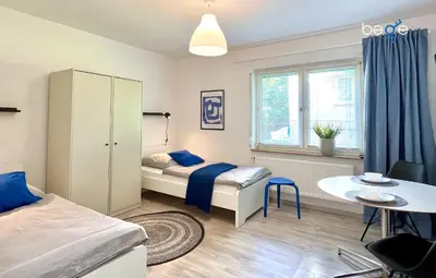 Ein Bett oder Betten in einem Zimmer der Unterkunft BEGE APARTMENTS Company Base