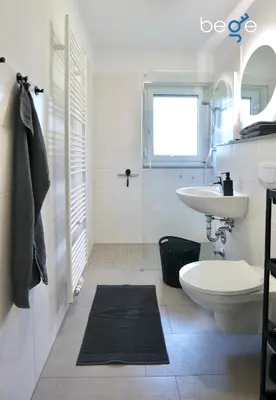 Ein Badezimmer in der Unterkunft BEGE APARTMENTS Company Base