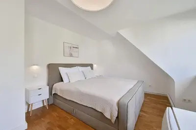Ein Bett oder Betten in einem Zimmer der Unterkunft Goodliving Apartments I serviced apartment