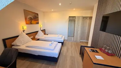 Ein Bett oder Betten in einem Zimmer der Unterkunft Bootshaus Hamm